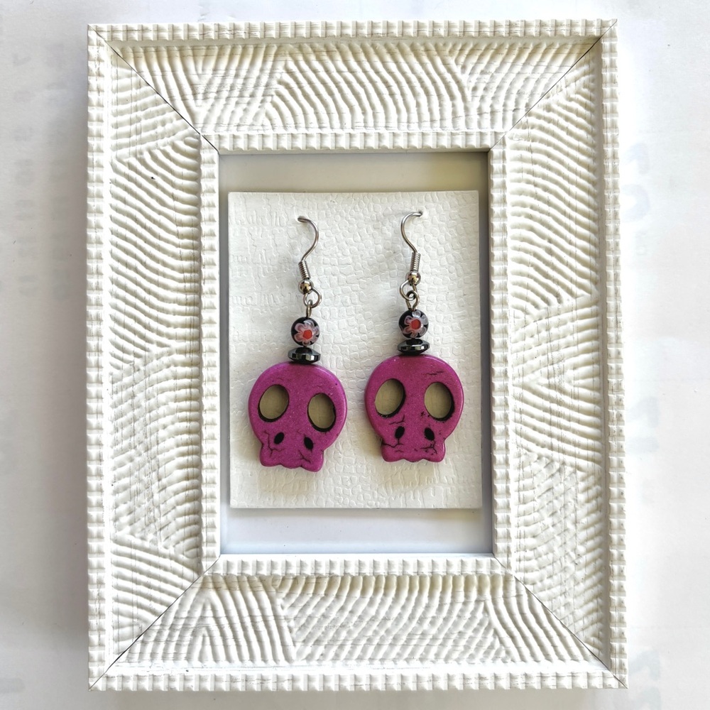 pink skull and dark floral beads dangle earrings
